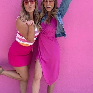 Pink dress with slit and angled design leg